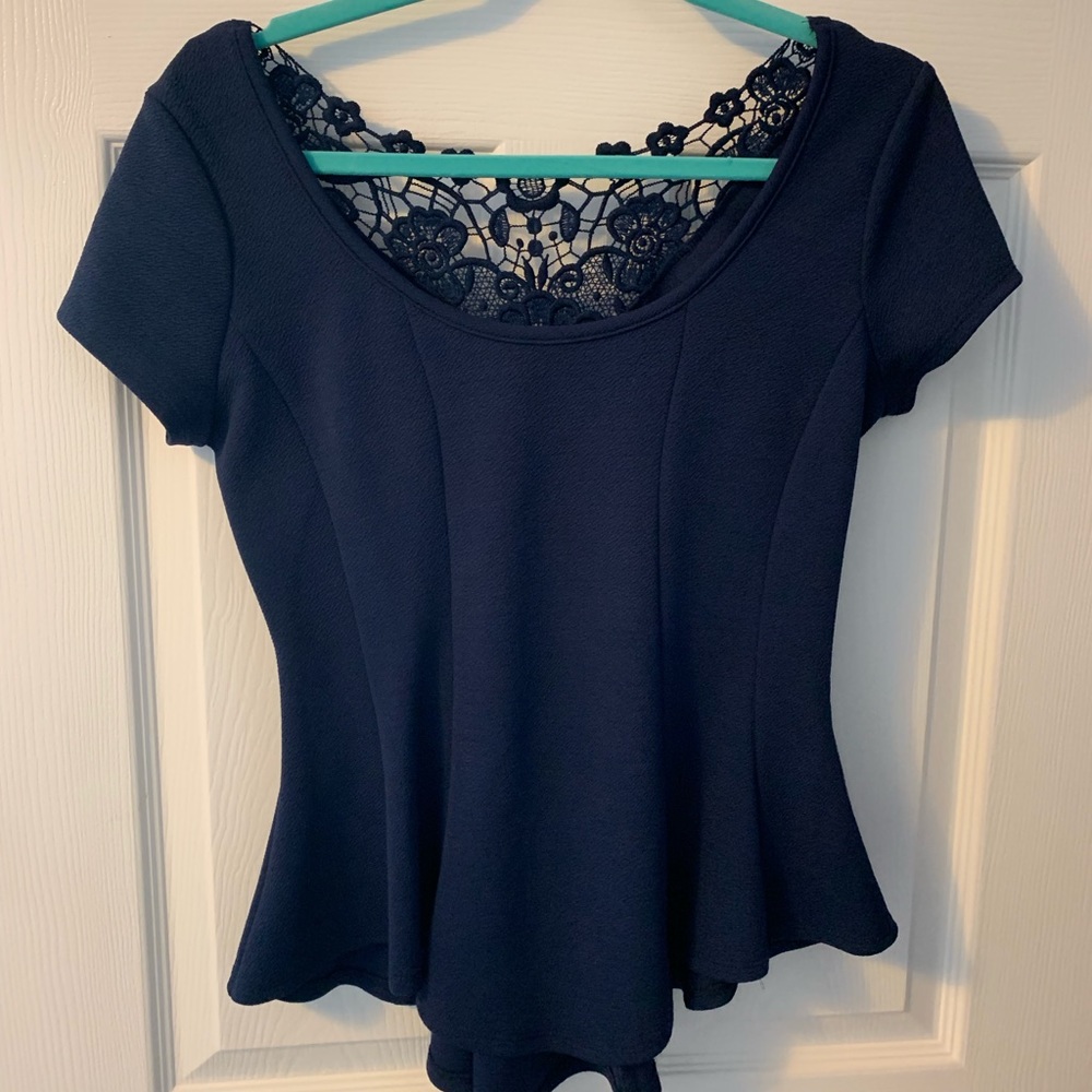 Navy peplum lace back top
